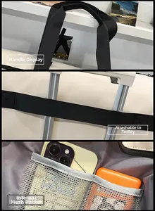 Detailansicht der verstärkten Griffe, Kofferband und inneren Netztasche der Reisetasche