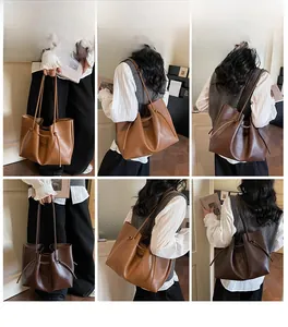 Detailed views of the large vintage tote bag featuring side drawstrings and litchi texture