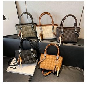 Multi-color collection of checkered bucket bags with wooden bead tassel details
