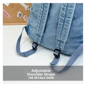 Close-up of adjustable padded shoulder straps on a blue denim backpack for casual wear