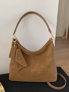 Vintage brown suede hobo tote bag with gold hardware and small envelope pouch