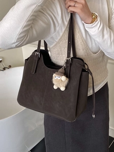 Deep brown large capacity suede tote bag with drawstring and cute plush charm pendant