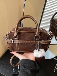 Brown Boston bag in suede and smooth leather with silver hardware and pompom charm