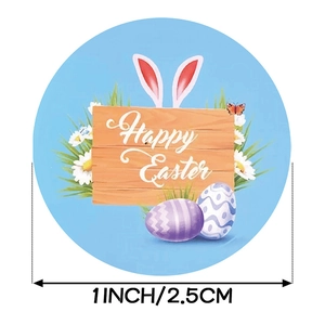 1 Zoll runde Happy Easter Aufkleber mit Hasenohren und bunten Eiern auf blauem Grund