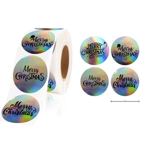 Roll of 3.8cm holographic rainbow Merry Christmas stickers with round festive designs