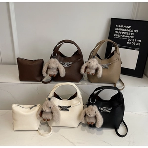 Litchi texture bucket bag set in four colors with bunny charm and silver metal bow lock