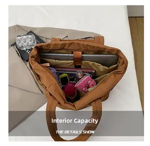 Detail of spacious interior layout showing multiple compartments and laptop storage space