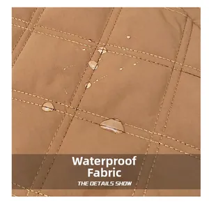 Macro shot of brown diamond quilted waterproof fabric with clear hydrophobic water droplets