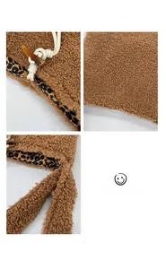 Detail of plush fleece bag with leopard print lining, rope handle and horn button closure