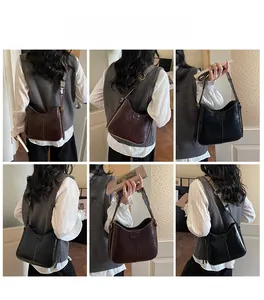 Detailed views of vintage bucket bags in black and brown with wide ethnic shoulder straps