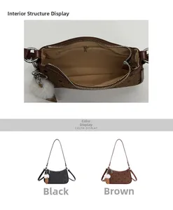 Internal zip pocket and color comparison of polka dot underarm bags in black and brown