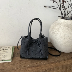 Chic polka dot tweed tote bag with leather bow and shoulder strap for casual style