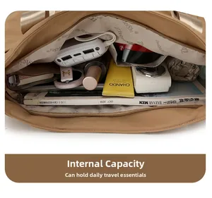 Top view showing the large internal capacity and functional compartments of the nylon tote bag