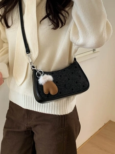 Polka dot underarm bag in dark grey tweed with leather strap and brown glove charm