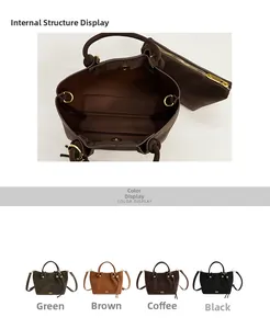 Detail view of suede bucket bag featuring detachable zipper pouch and versatile metal D-rings