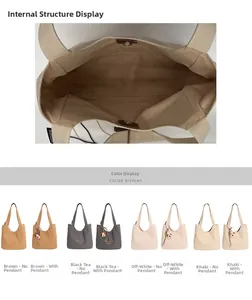 Detail of canvas tote interior with magnetic buckle and multi-color swatches with charms