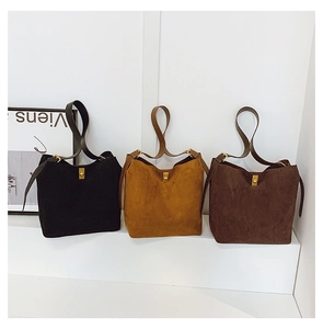 Three-color bucket bags in black, tan and dark coffee with matte finish and gold hardware