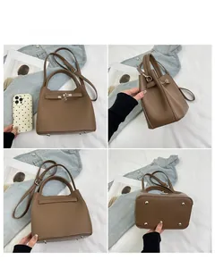 Detailed views of brown lychee grain leather handbag with metal buckle and base studs