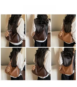Detailed back view of women's soft leather tote bag in dark and light brown options