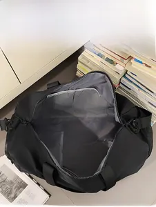 Detail view of large travel bag interior with mesh pockets and grey lining