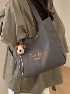 Women Large Capacity Canvas Bucket Bag Minimalist Retro Tote Bag With Letter Embroidery And Detachable Plush Dog Pendant
