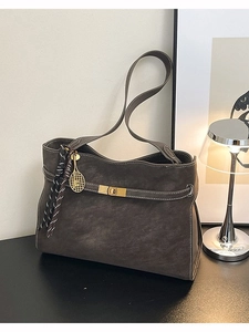 Large matte shoulder tote bag for women in dark grey featuring golden charm and contrast stitching