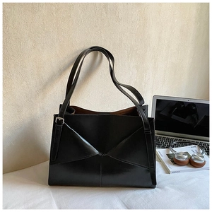 Borsa tote nera minimalista con cuciture geometriche per il lavoro e l'uso quotidiano