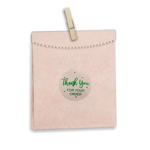 Clear round Thank You For Your Order stickers with green gold foil font and heart detail
