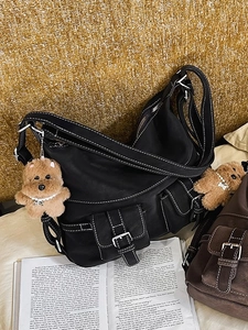 Retro black high-capacity nylon tote bag with contrast stitching and plush dog charm