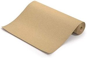 Macro detail of natural brown kraft paper roll showing matte texture and flexibility