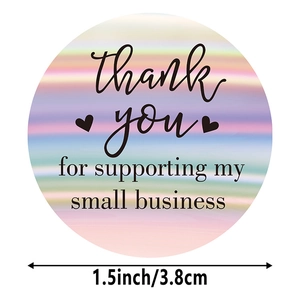 Detailed view of 1.5 inch holographic thank you sticker with rainbow laser finish effect