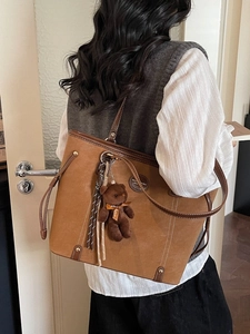 Classic caramel tote bag in matte suede with teddy bear charm for women's daily commute
