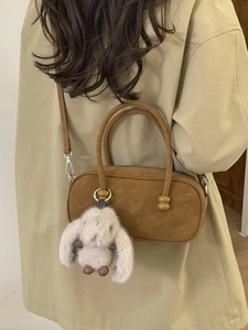 Vintage brown suede pillow handbag with cute rabbit pendant and twin handles