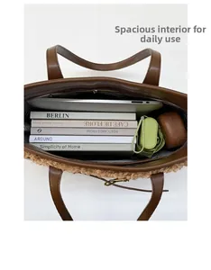 Interior view of large tote bag showing capacity for laptop, books, and umbrella