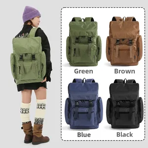 Detail view of large checkered backpacks in green, brown, blue, and black color options