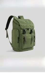 Detail of lightweight green plaid backpack weighing only 0.52kg, showing buckle and pockets