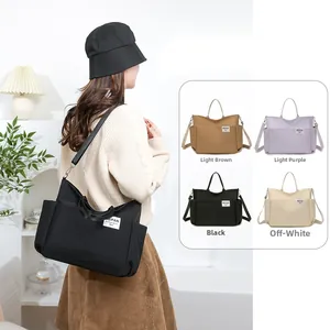 Detail showing high-capacity nylon tote bags in black, brown, purple and beige colors