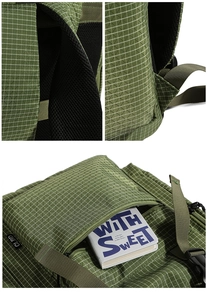 Close-up of military green grid backpack showing breathable mesh back and stitch details