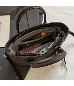 Top view of spacious interior with zipper pockets showing storage capacity for daily items