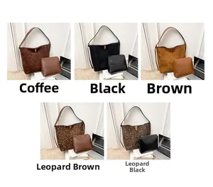 Detail of five vintage leopard and suede tote bags set showing varied colors and textures