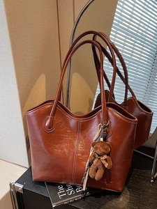 Brown large capacity PU leather tote bag with vintage texture and cute bear pendant
