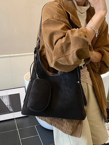 Retro black oversized hobo shoulder bag with white stitching and matching small pouch