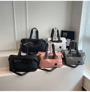 Five colors of large capacity travel bags with leather handles and adjustable straps