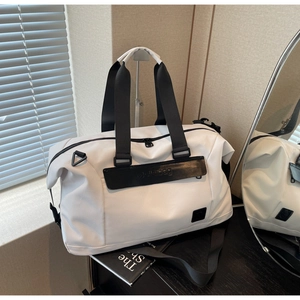 Close-up of white waterproof fitness bag featuring black handles and Jolialbag logo detail