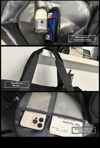 Detail of waterproof dry-wet separation pocket and reinforced handles on travel bag
