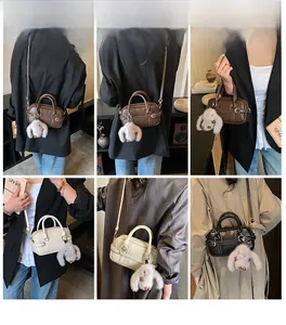 Detailed model views of retro pillow bags in multiple colors with cute bunny charms