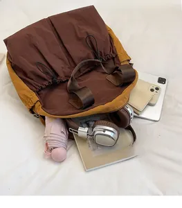 Detailed interior of nylon travel tote showing large capacity storage for daily items