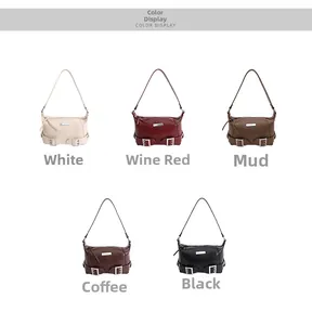 Detail view of stylish underarm bags showing various retro colors and metal buckle decor