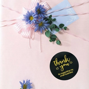 Black round 'Thank You' stickers with gold foil heart for small business packaging