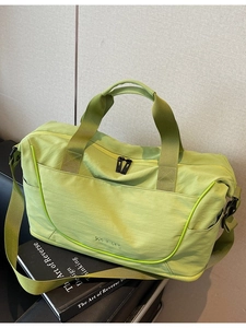 Large capacity green travel bag with adjustable strap and dual handles for gym and travel